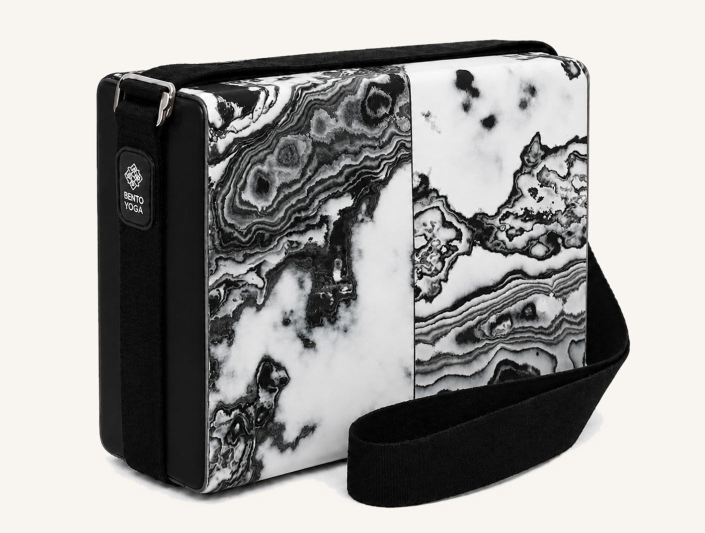 The closed Bento Yoga set with its cotton carrying strap