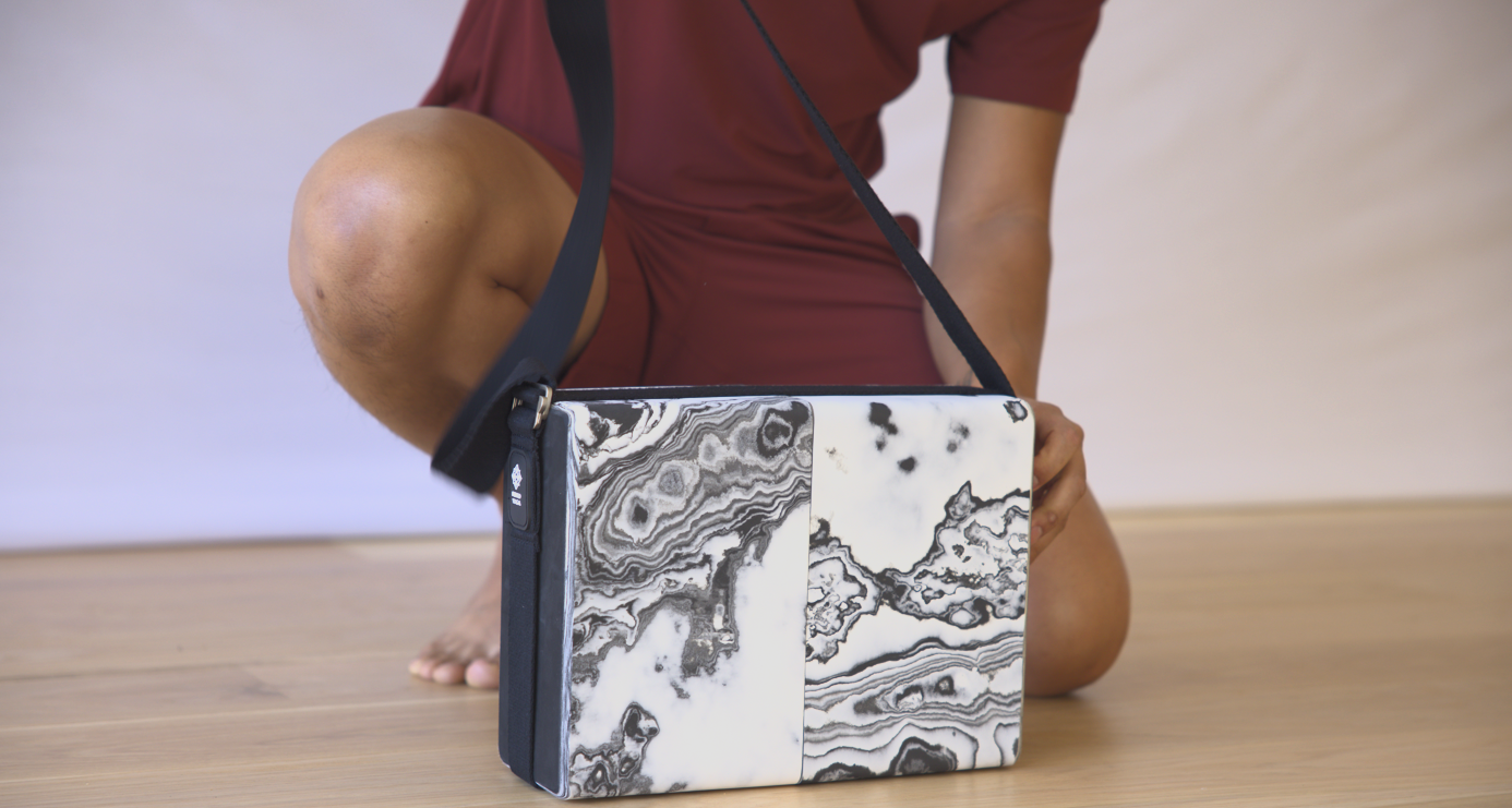 Bento Yoga ONE secured by its carrying strap